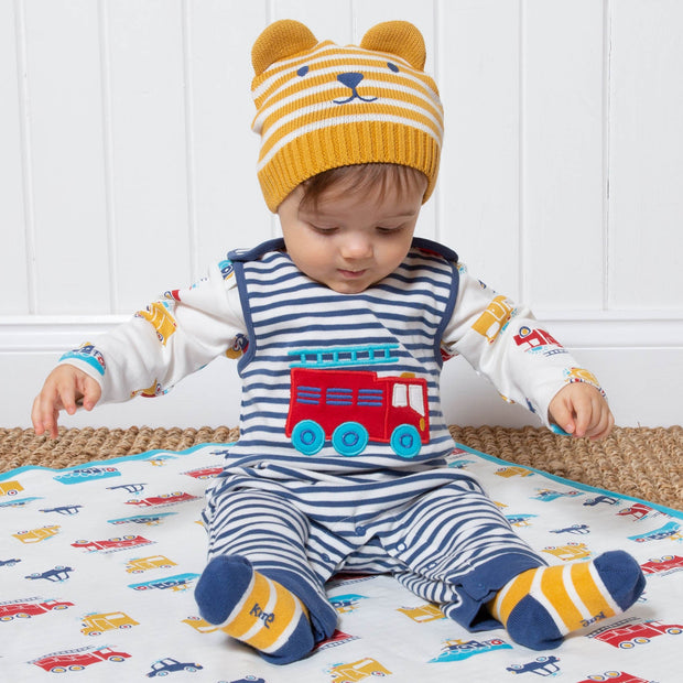 Baby in rescue dungarees