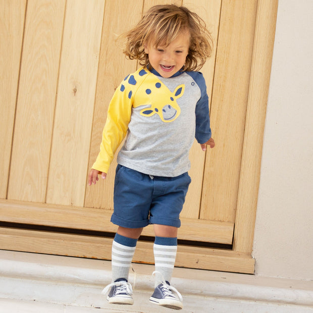 Boy in sport stripe socks