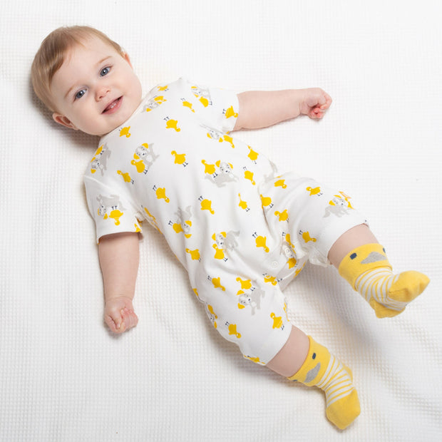 Baby in pup and duck romper