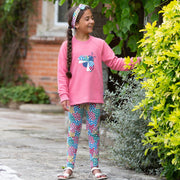 Girl in ladybird sweatshirt