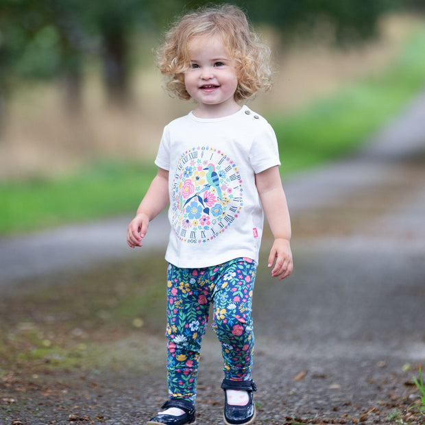 Girl in petal press leggings