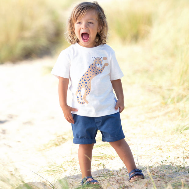 Boy in big cat t-shirt