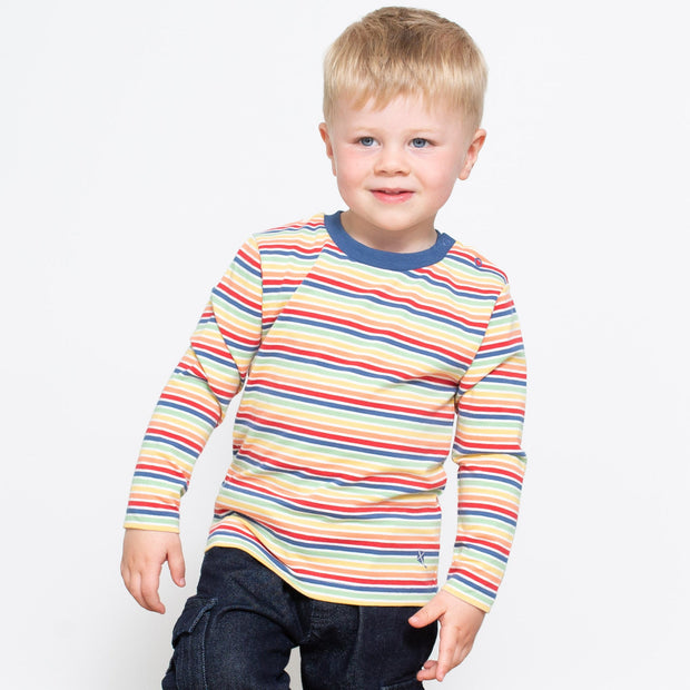 Boy in rainbow stripe t-shirt