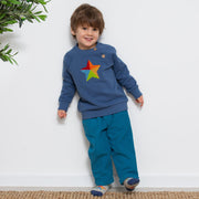 Boy in super star sweatshirt