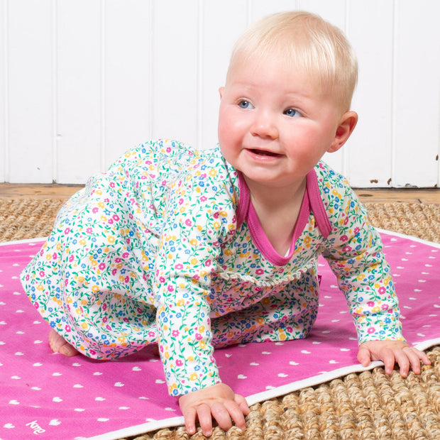 Baby in wildflower bodydress