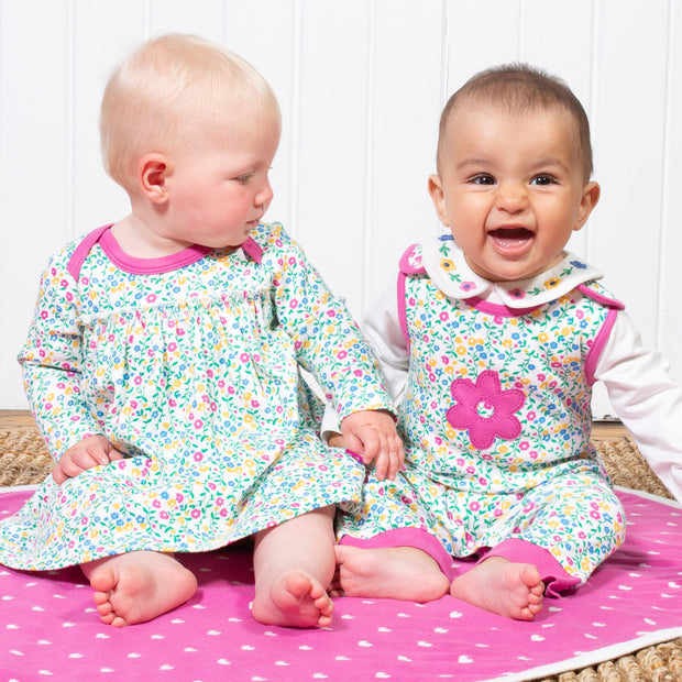 Baby in wildflower bodydress