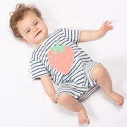 Baby in strawberry romper