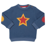 Boy in quilted star sweatshirt