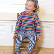 Girl in mini stripy leggings