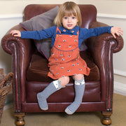 Girl in foxy pinafore set