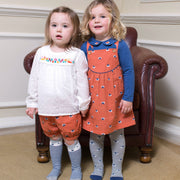 Girl in foxy pinafore set