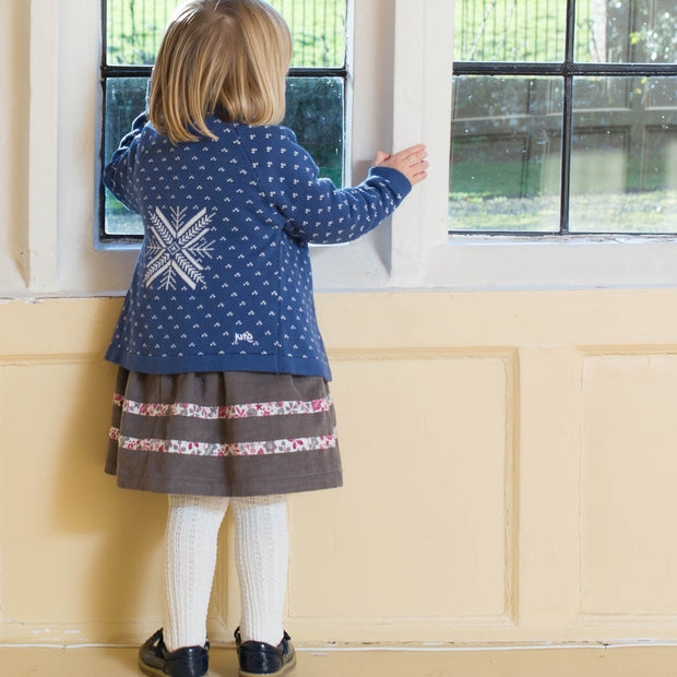 Girl in snow spot cardi