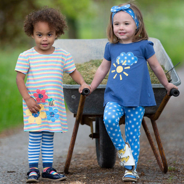 Girl in busy bee dress