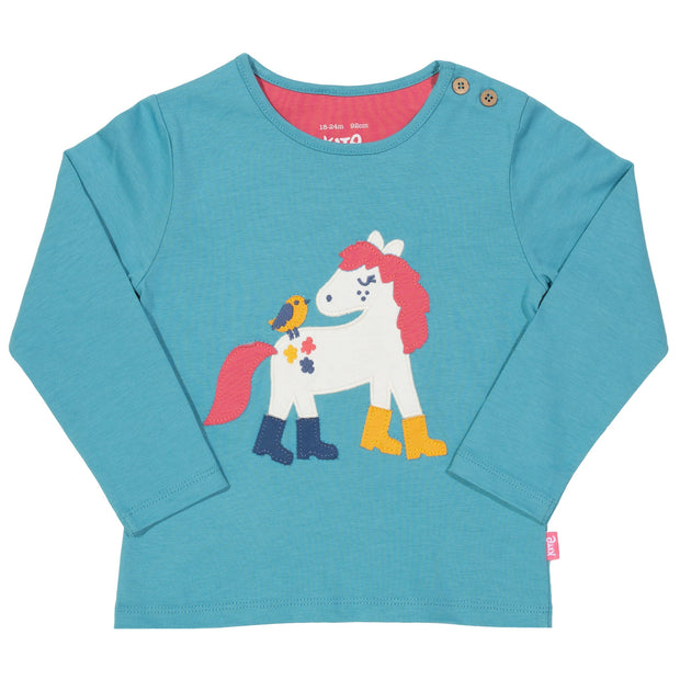 Girl in puddle pony t-shirt