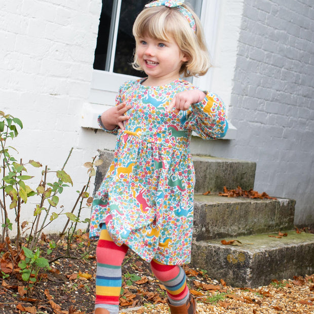 Girl in pretty pony dress