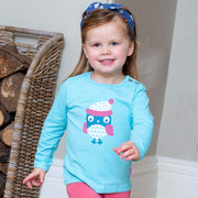 Girl in owl t-shirt