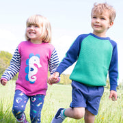 Girl in seahorse jumper