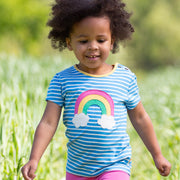 Girl in rainbow t-shirt