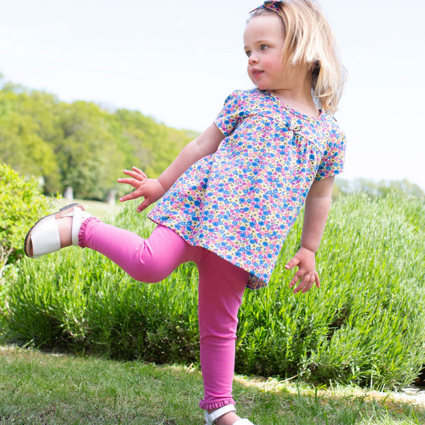 Girl in bee ditsy tunic