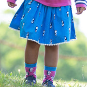 Girl in seahorse skirt