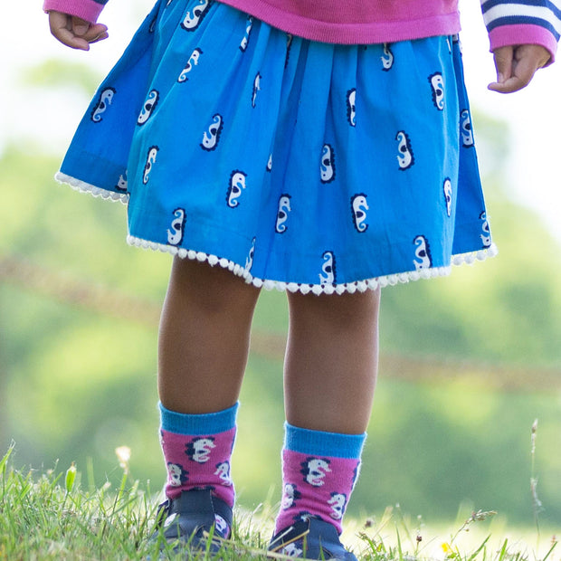 Girl in seahorse skirt