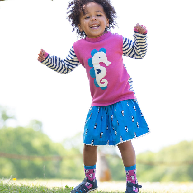 Girl in seahorse skirt