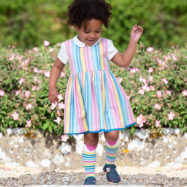 Girl in seahorse stripe dress